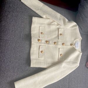 Little white jacket with gold buttons